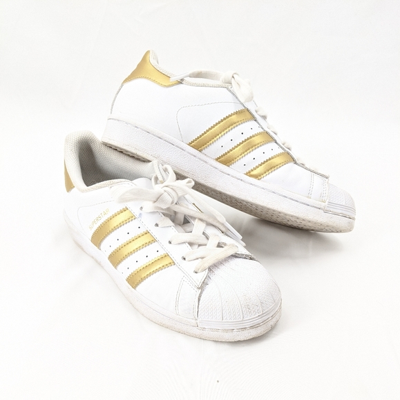 adidas superstar yellow stripe